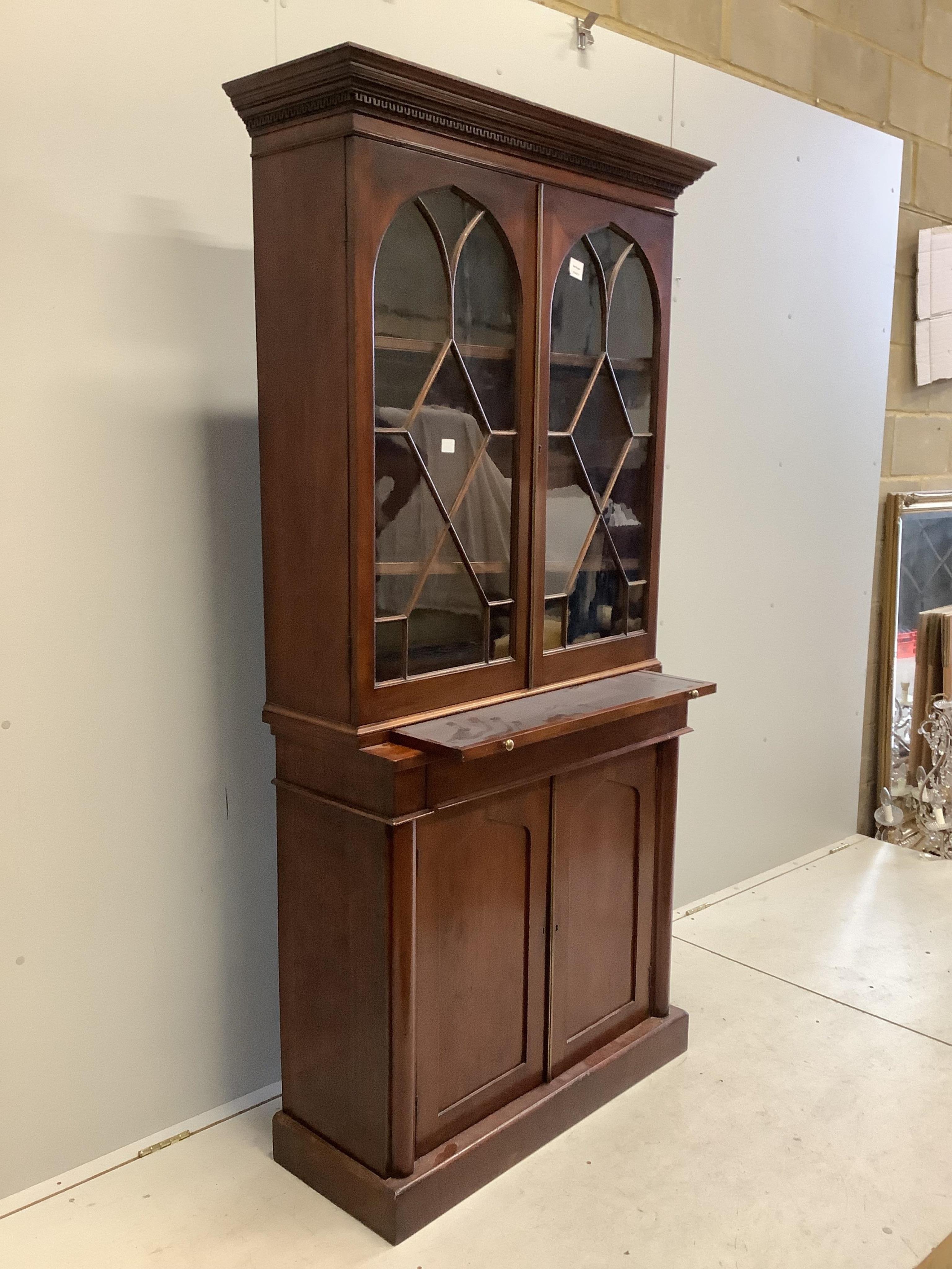 A Victorian mahogany chiffonier bookcase, width 91cm, depth 37cm, height 186cm. Condition - fair